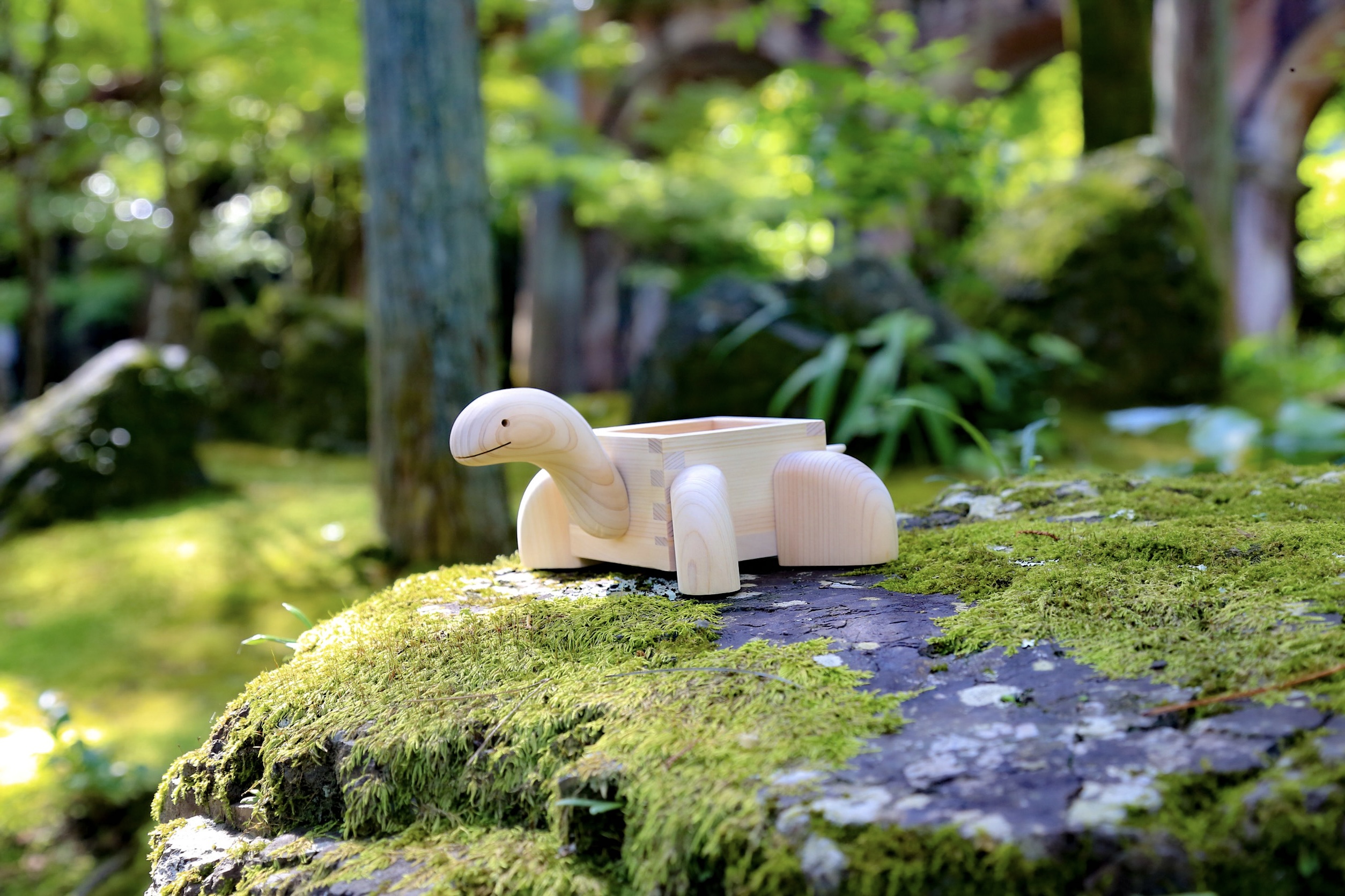 MASUKAME luxury wooden sculpture - Hinoki carving in natural setting